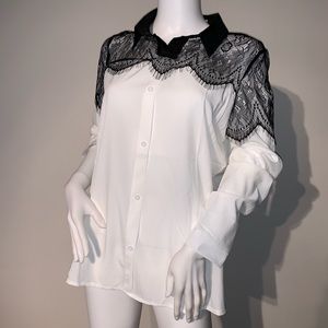 Black eyelash lace on a longsleeve white blouse